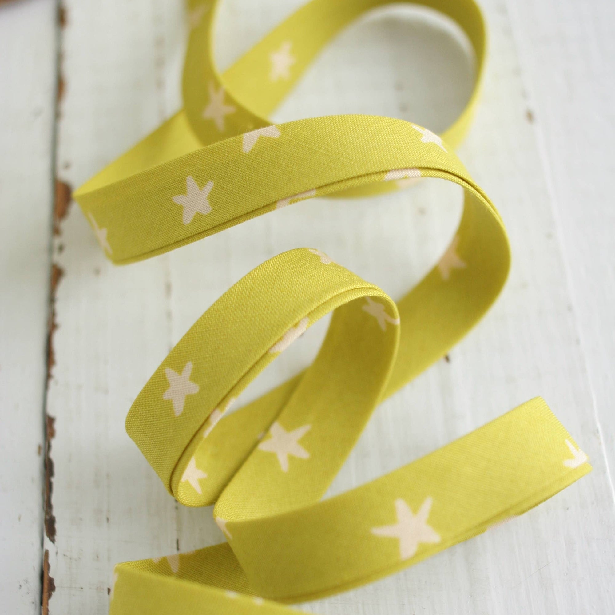 1/2" Double Fold Bias Binding - Starry Pistachio Ruby Star, one yard