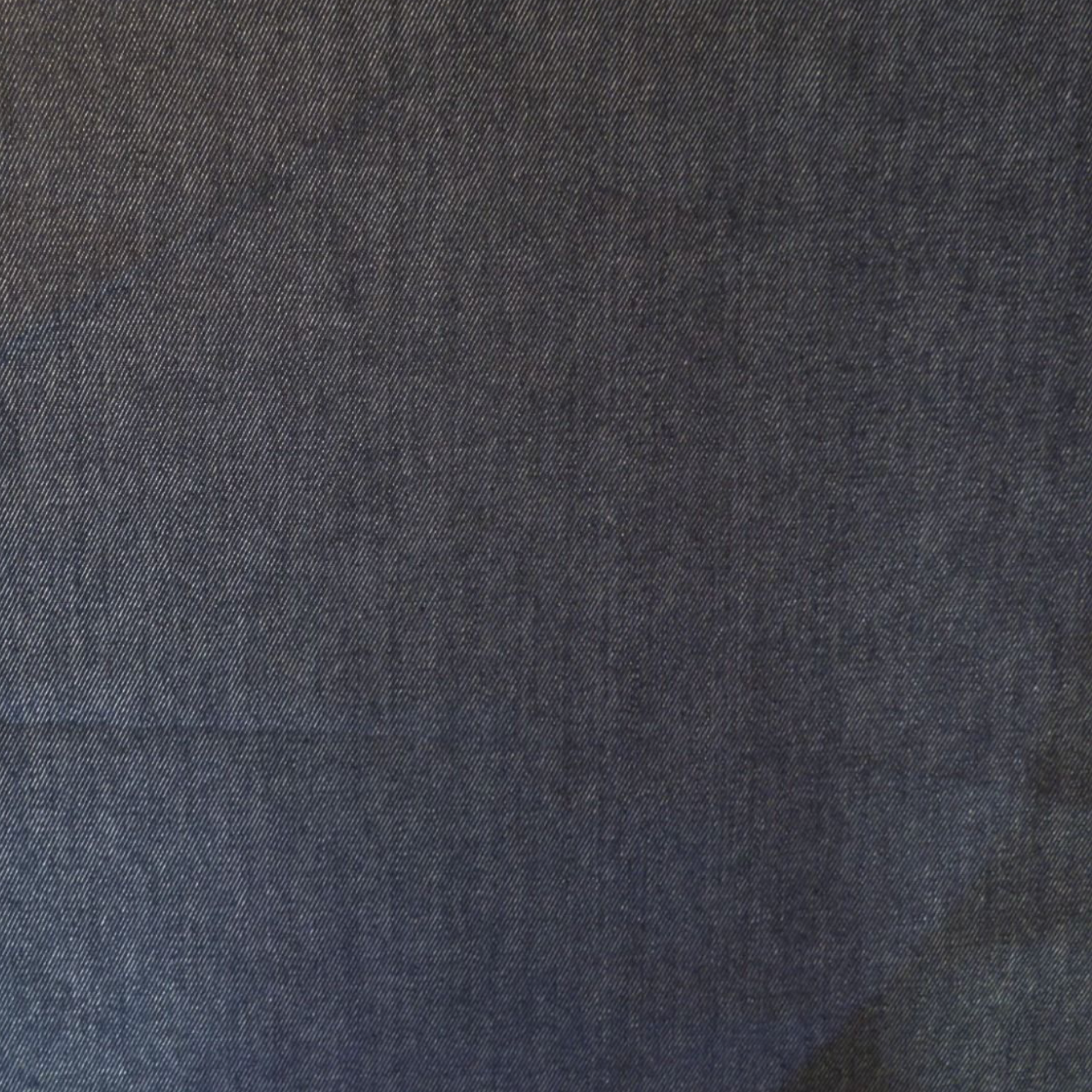 close up are dark indigo denim fabric