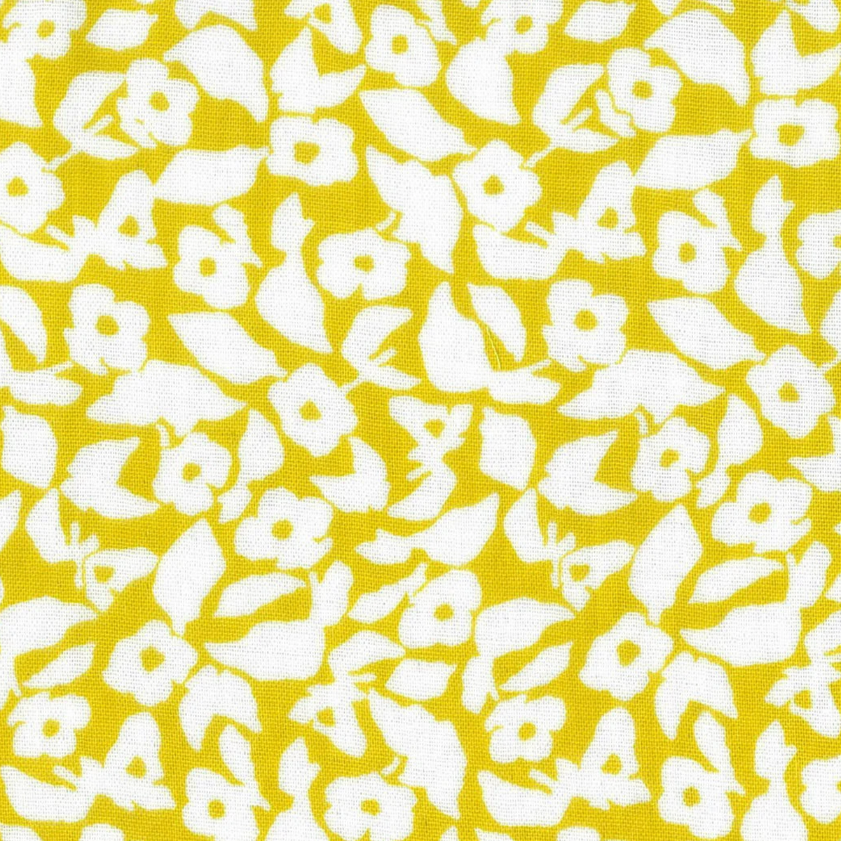 A close-up of a yellow and white floral patterned fabric, showing a repeating design of stylized flowers and leaves.